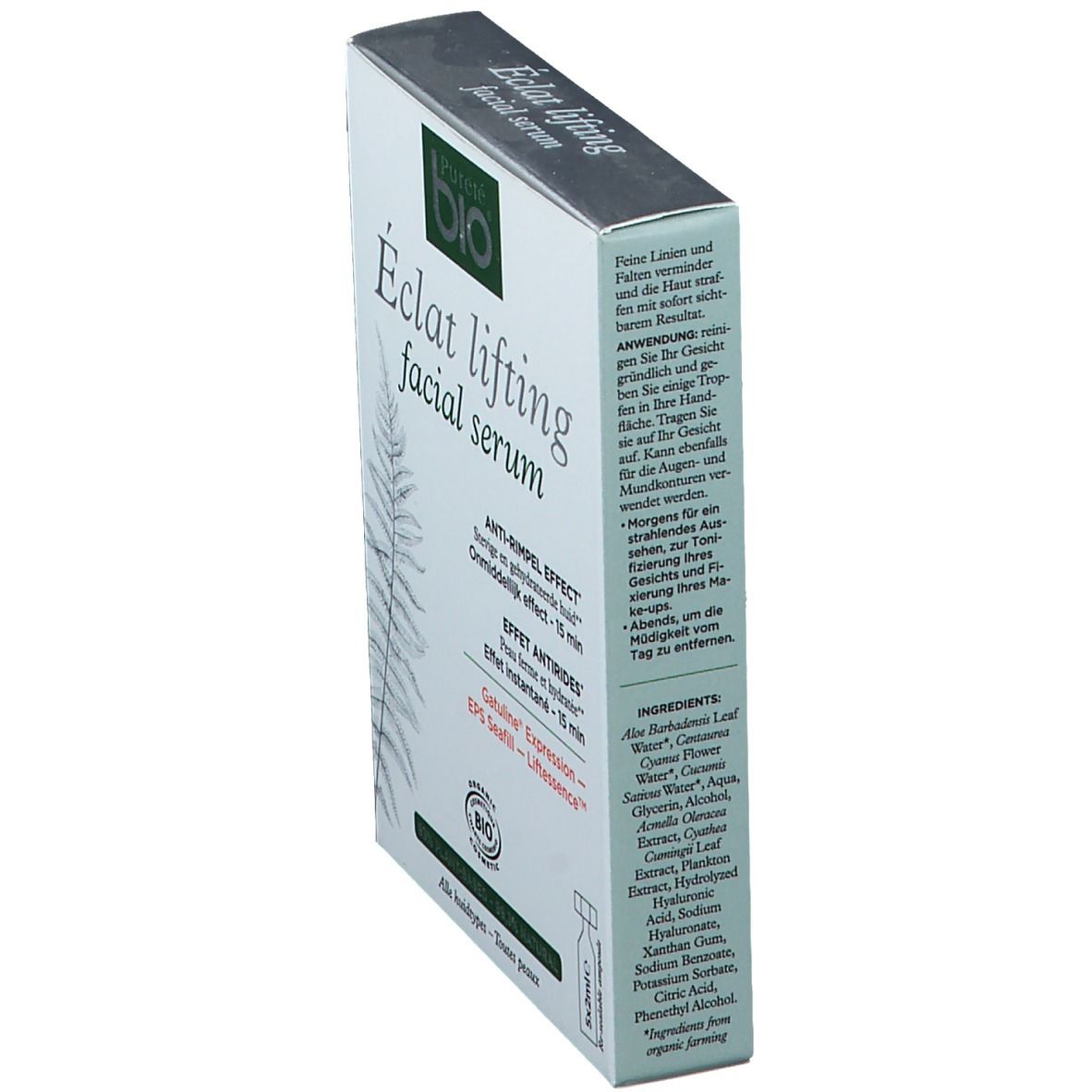 Boîte de sérum facial en biais. Nom et logo visibles. Ingrédients et instructions d'utilisation imprimés.