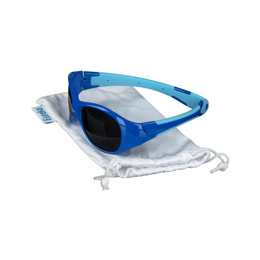 Lunettes de soleil bleues pour enfants, branches bleu clair, sur pochette blanche. Marque Eureka.