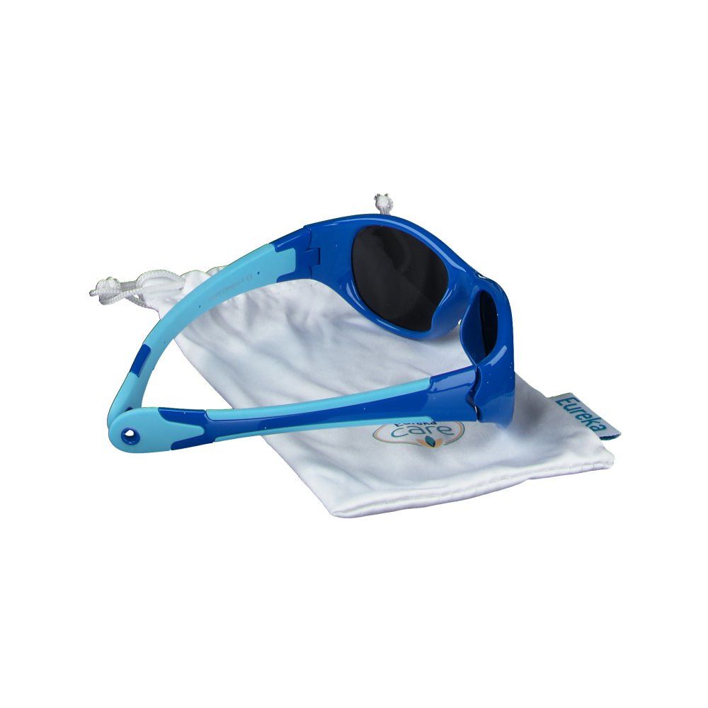 Lunettes de soleil bleues pour enfants, branches bleu clair, sur pochette blanche. Marque Eureka.