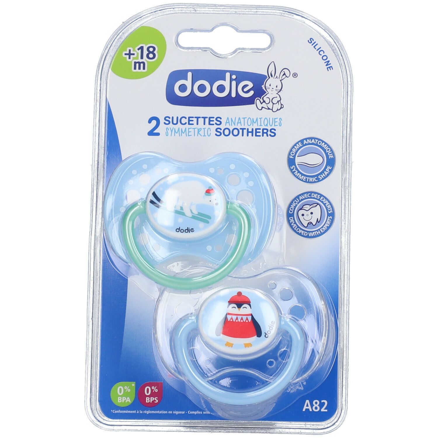 Deux sucettes bleues avec motifs ours polaire et pingouin, anneaux verts, dans un emballage. Marque Dodie visible. Texte et logo.