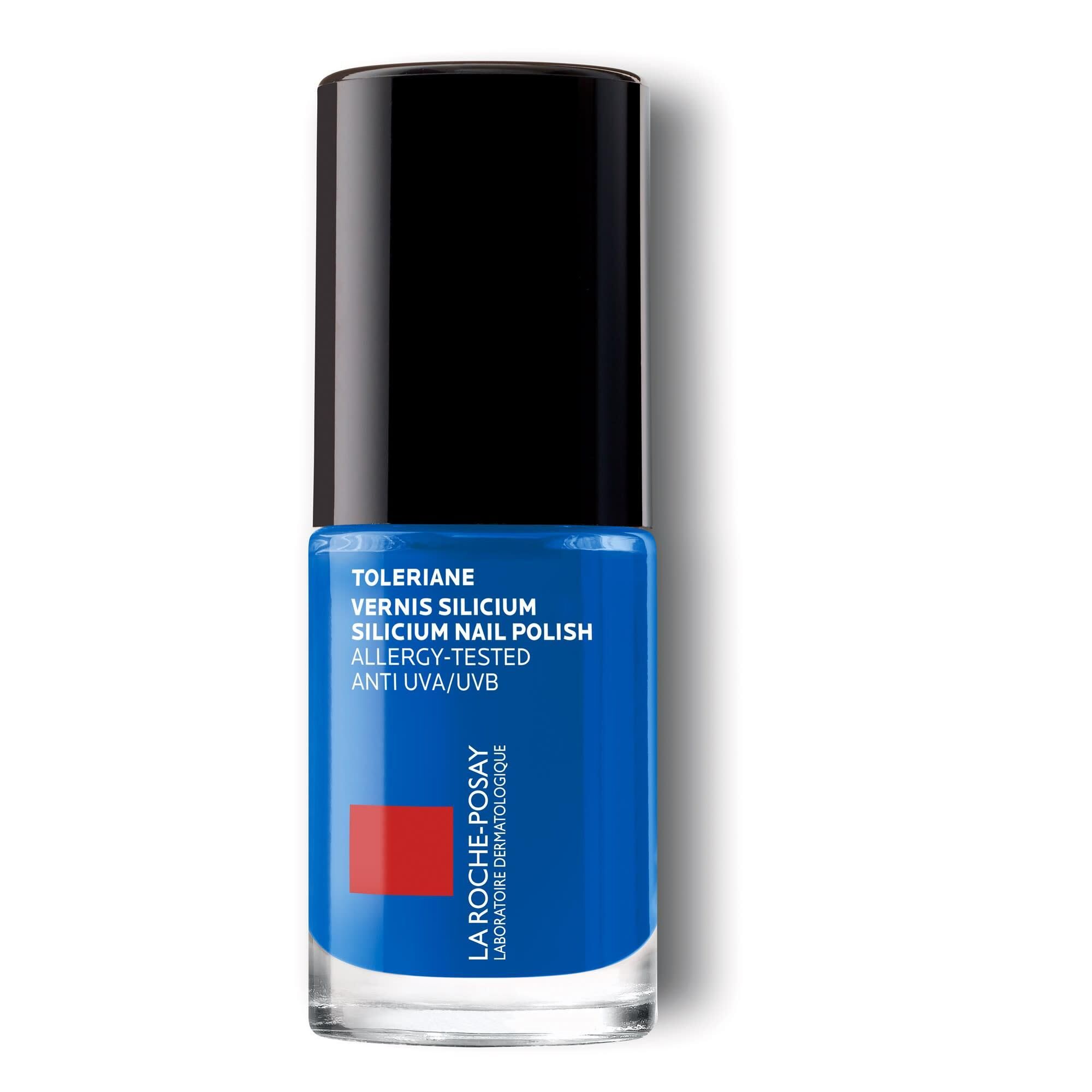 Flacon de vernis à ongles bleu avec bouchon noir. Marque La Roche-Posay. Texte: Toleriane, Vernis Silicium.