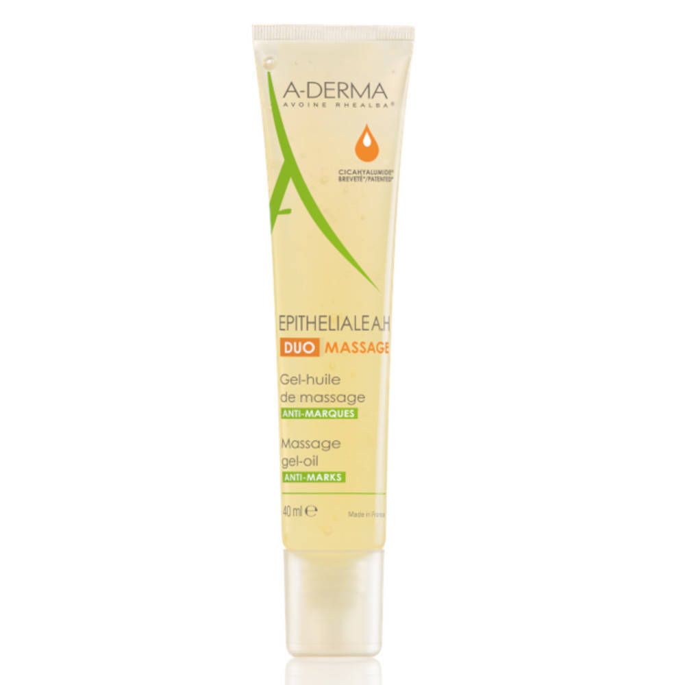 Tube de gel-huile de massage A-Derma Epitheliale A.H Duo. Pour cicatrices et vergetures. Tube vert et jaune avec bouchon blanc.