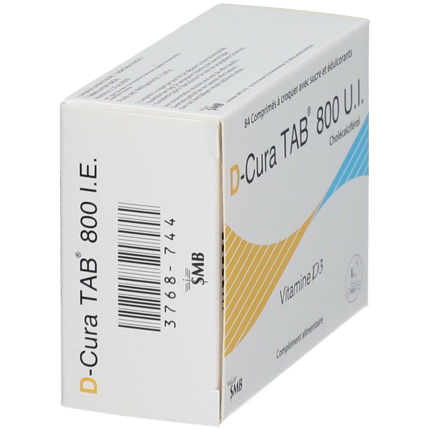 Boîte blanche, inscription D-Cura TAB 800 I.E. Code-barres et logo SMB. Contient 84 comprimés. Inscription: Vitamine D3. Éléments décoratifs.
