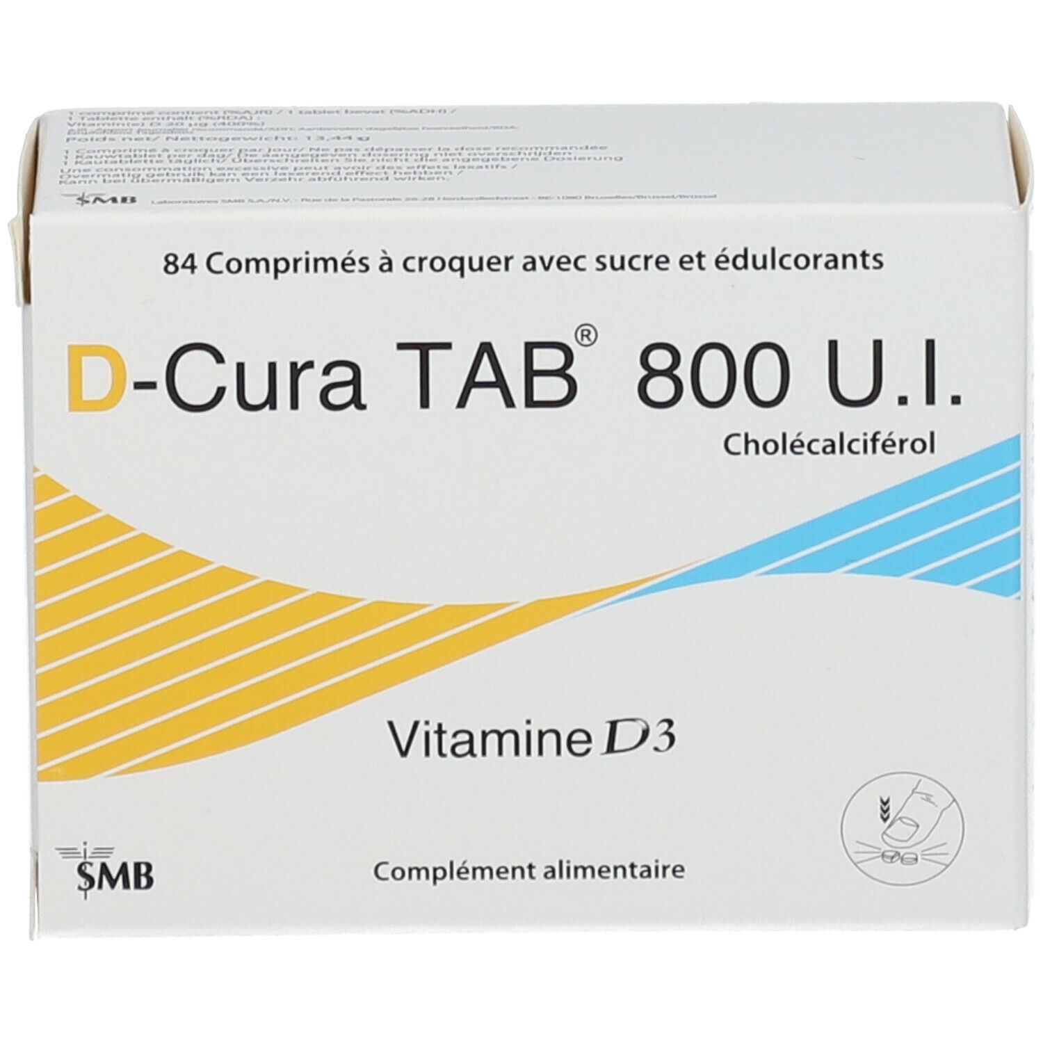 Boîte blanche D-Cura TAB 800 U.I. Contient 84 comprimés à croquer. Inscription: Vitamine D3. Éléments décoratifs jaunes et bleus.