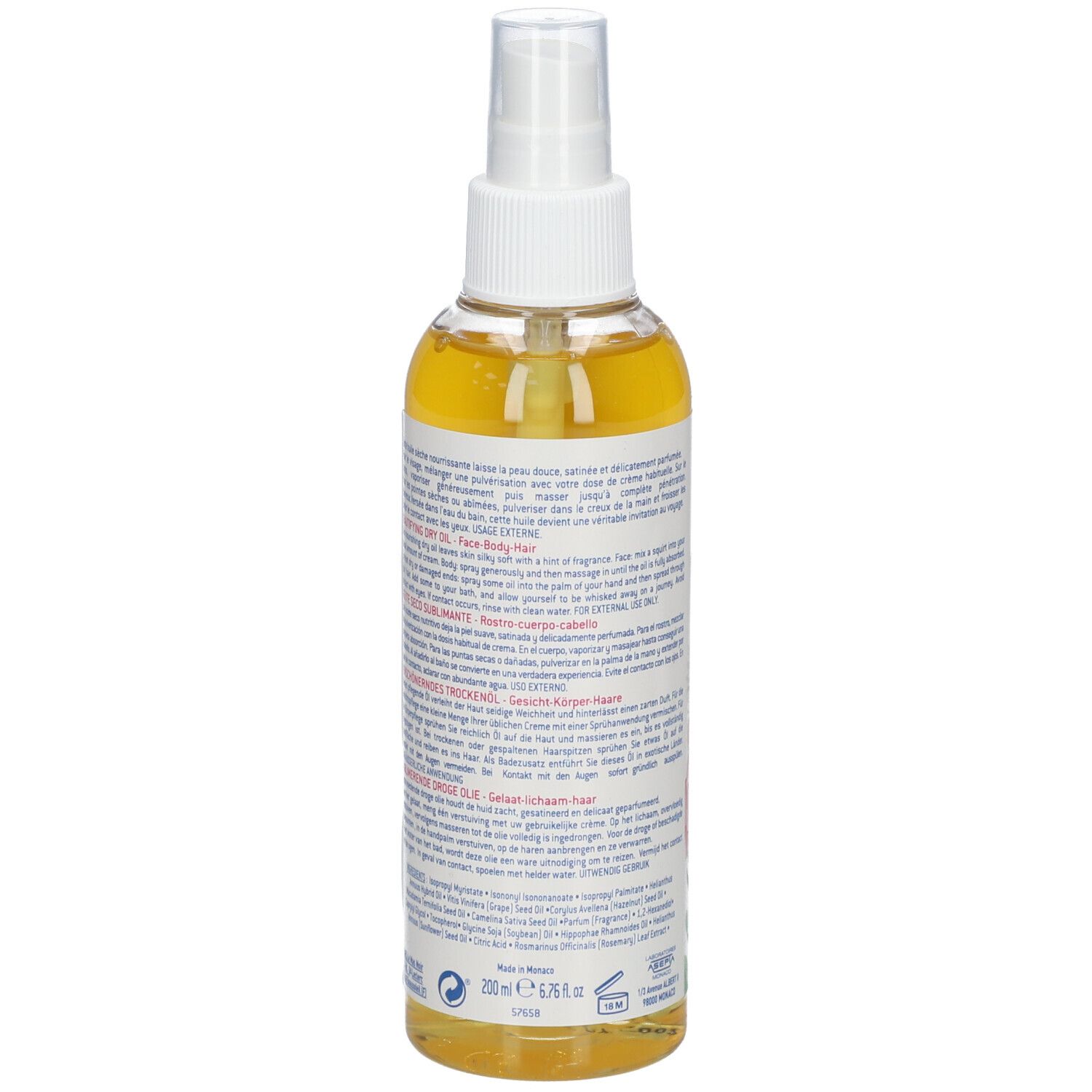 Dos d'un flacon spray d'huile. Texte: Coup d'Eclat, informations sur le produit, fond floral.