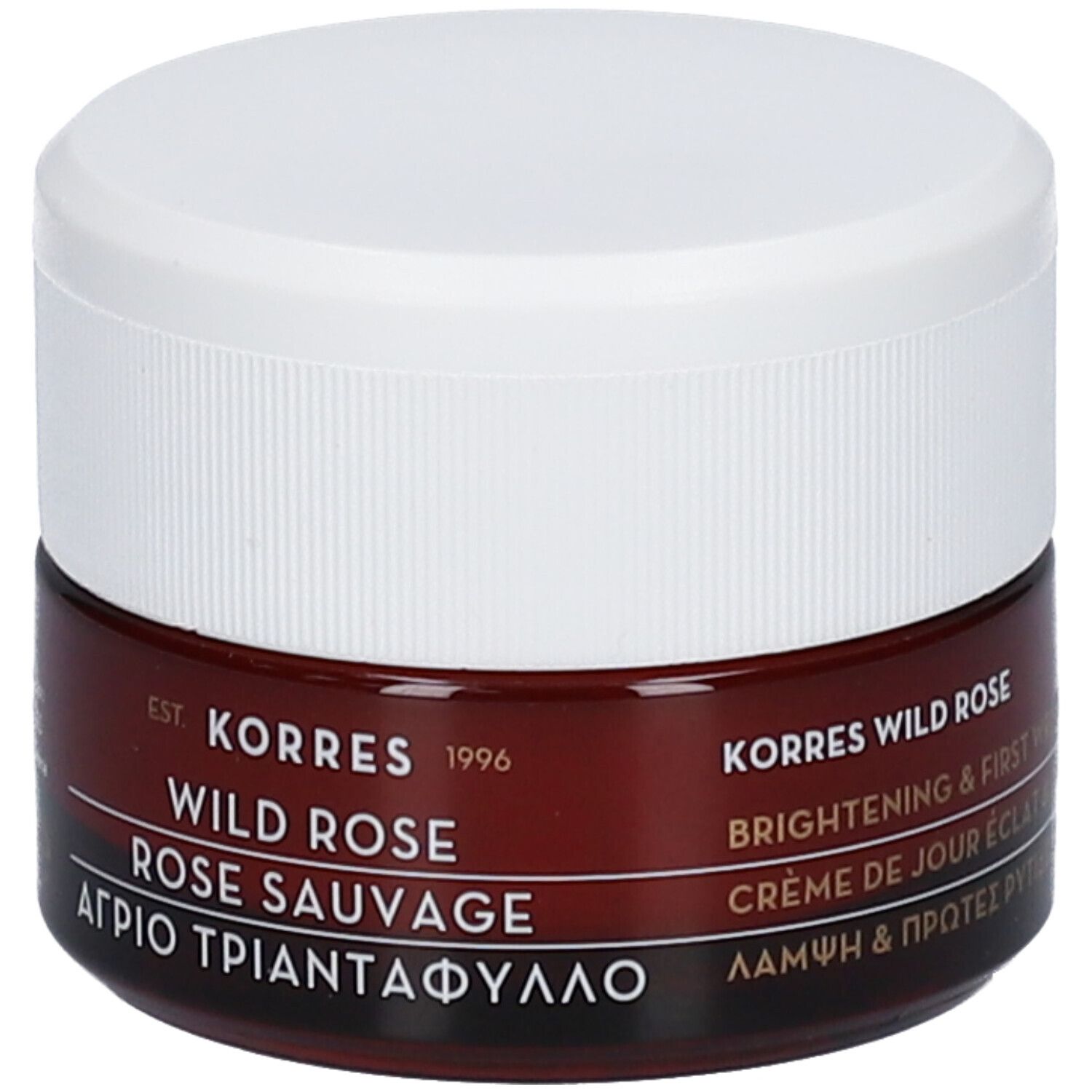 Pot de crème brun avec couvercle blanc. Inscription : KORRES WILD ROSE, ROSE SAUVAGE, texte grec.
