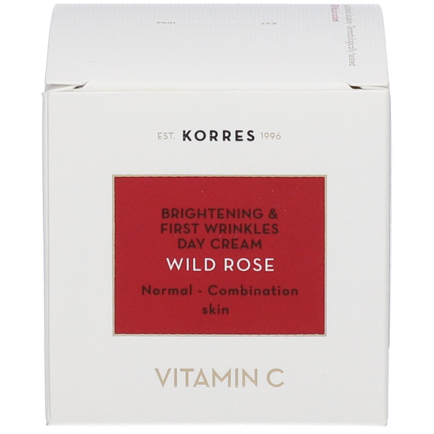 Emballage blanc avec champ rouge. Inscription : BRIGHTENING & FIRST WRINKLES DAY CREAM, WILD ROSE, Normal - Combination skin.