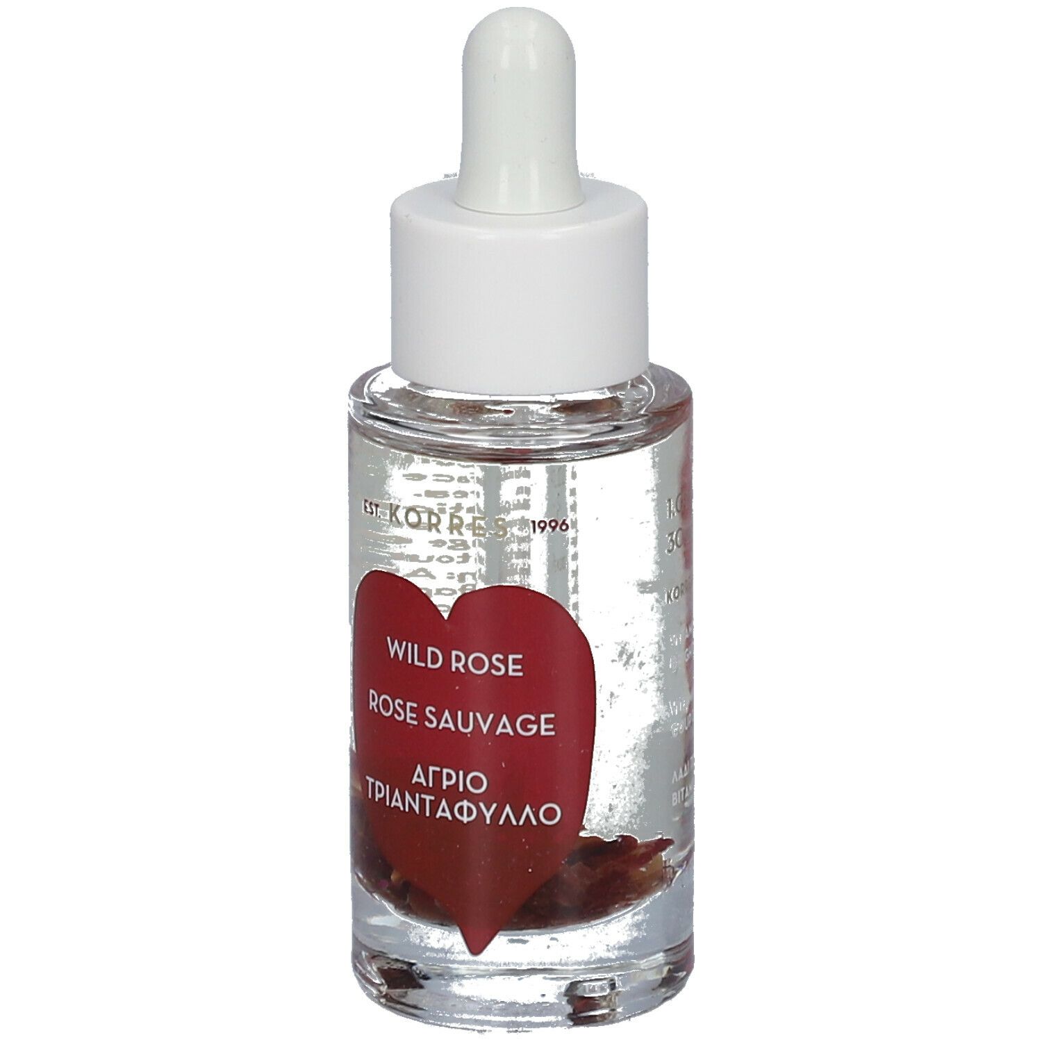 Flacon en verre transparent avec bouchon blanc et pipette. Étiquette rouge en forme de cœur avec texte. Wild Rose, Rose Sauvage, Αγριο Τριαντάφυλλο.