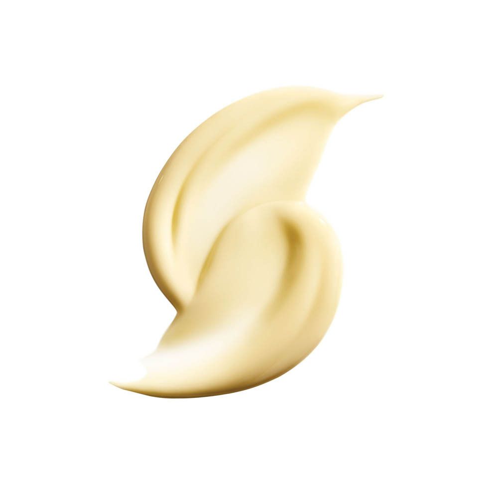 Une texture crémeuse, jaune pâle, en forme de courbe sur fond blanc.