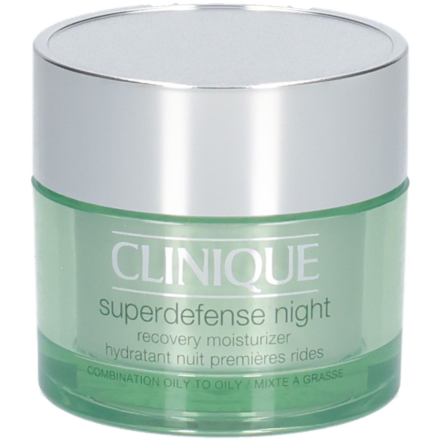 Pot vert avec couvercle argenté. Inscription: CLINIQUE, Superdefense night, recovery moisturizer.