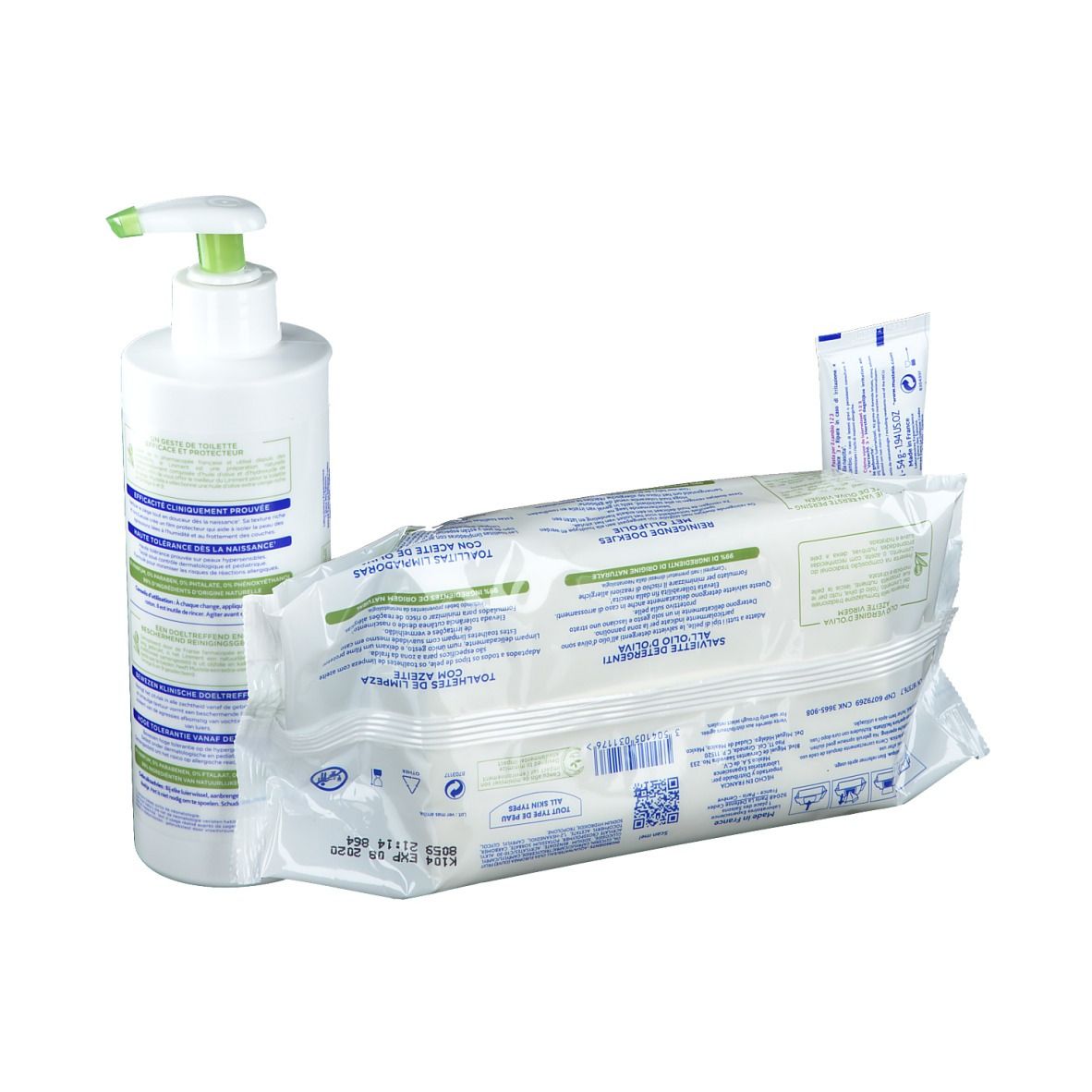 Flacon blanc avec pompe, paquet de lingettes et tube. Inscription: Mustela. Emballage vert et blanc.