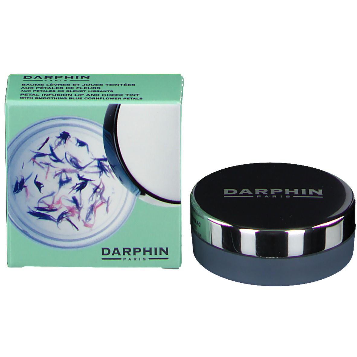 Emballage et contenant du produit. Emballage : boîte vert clair avec image du produit. Contenant : contenant gris avec bord argenté et couvercle noir.