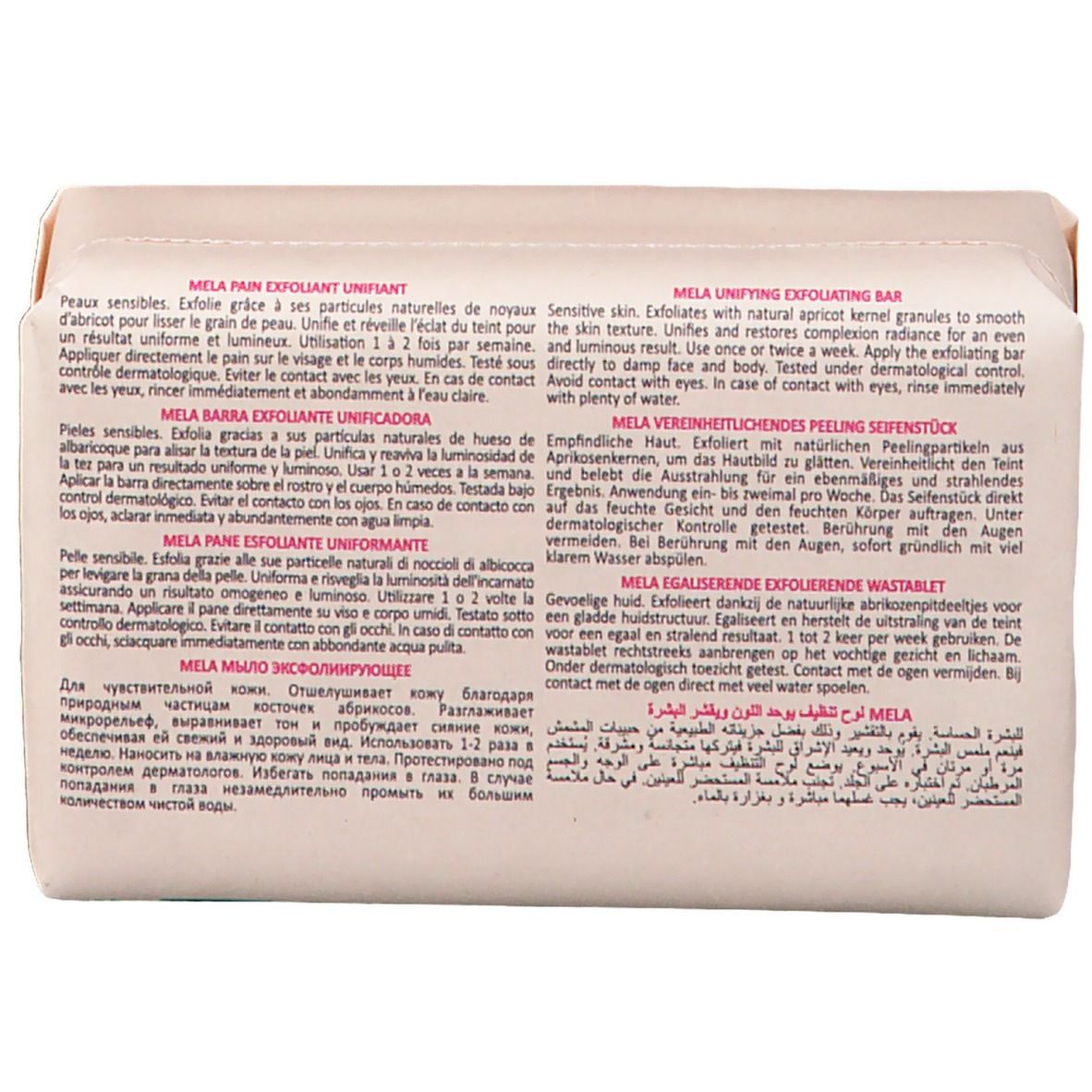 Dos du pain exfoliant TOPICREM. Texte multilingue. Contient des noyaux d'abricot. Inscription : "Mela Unifying Exfoliating Bar".
