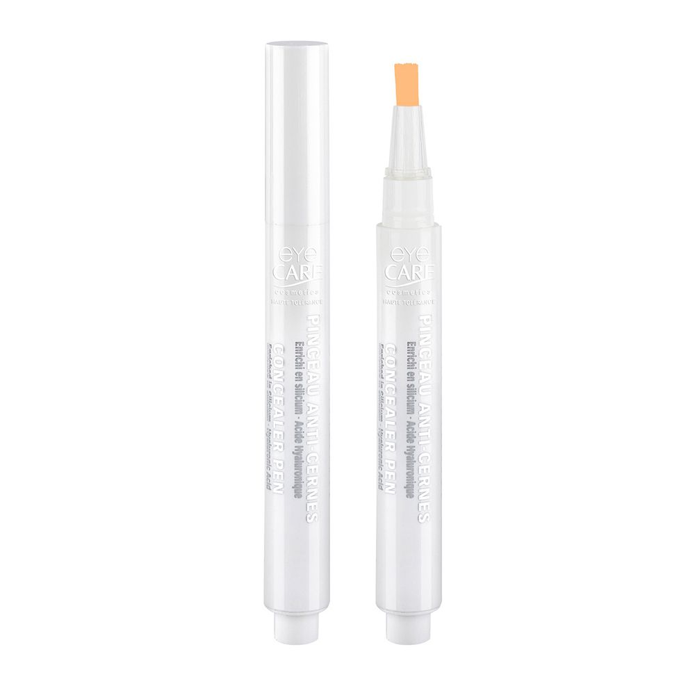 Deux stylos blancs avec un contenu orange clair. "Eye Care" est écrit sur l'un.