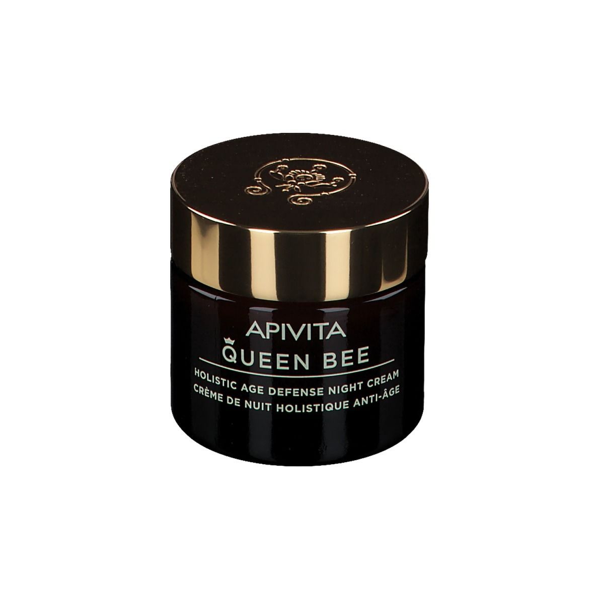 Pot en verre brun foncé avec couvercle doré. Inscription : APIVITA QUEEN BEE, Holistic Age Defense Night Cream.
