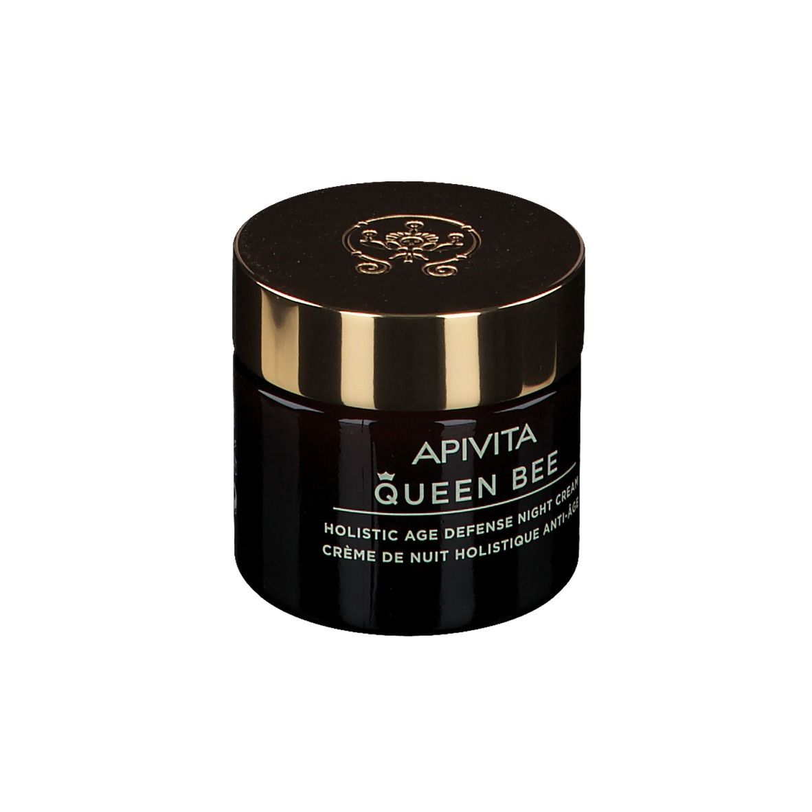 Pot en verre brun foncé avec couvercle doré. Inscription : APIVITA QUEEN BEE, Holistic Age Defense Night Cream.