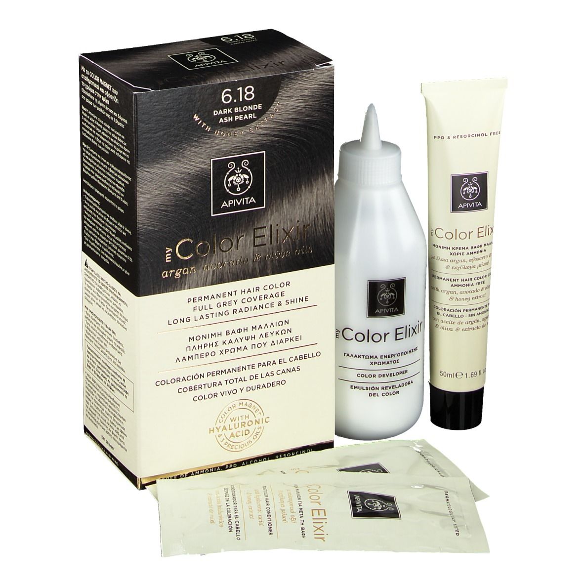 Kit de coloration capillaire. Comprend une boîte, une bouteille, un tube et des sachets. "6.18 Blond foncé" est visible.