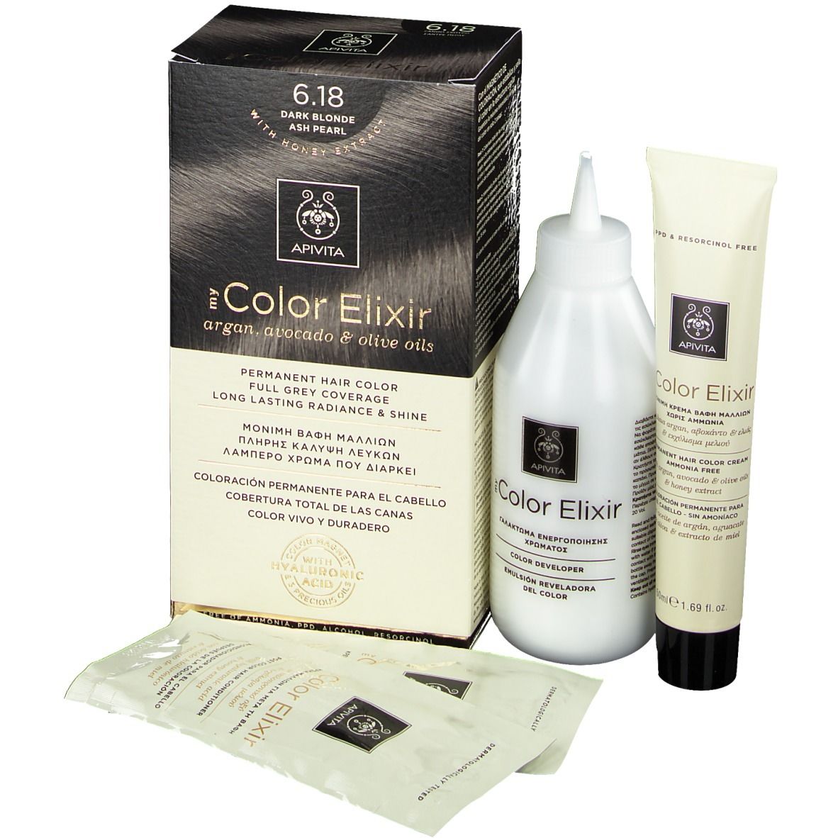 Kit de coloration capillaire. Comprend une boîte, une bouteille, un tube et des sachets. "6.18 Blond foncé" est visible.