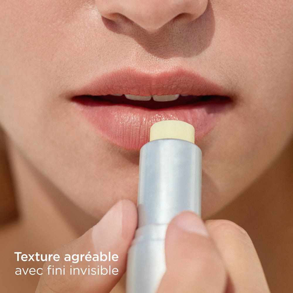 Stick à lèvres ISDIN Protector Labial 30. Orange et argenté. Texte sur le stick.