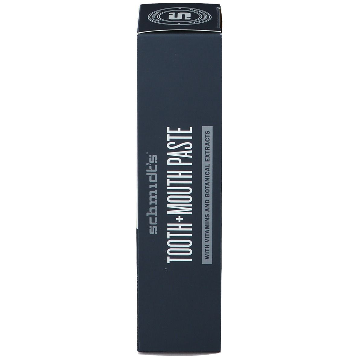 Emballage étroit du dentifrice. Inscription: Tooth + Mouth Paste. Avec vitamines et extraits botaniques.