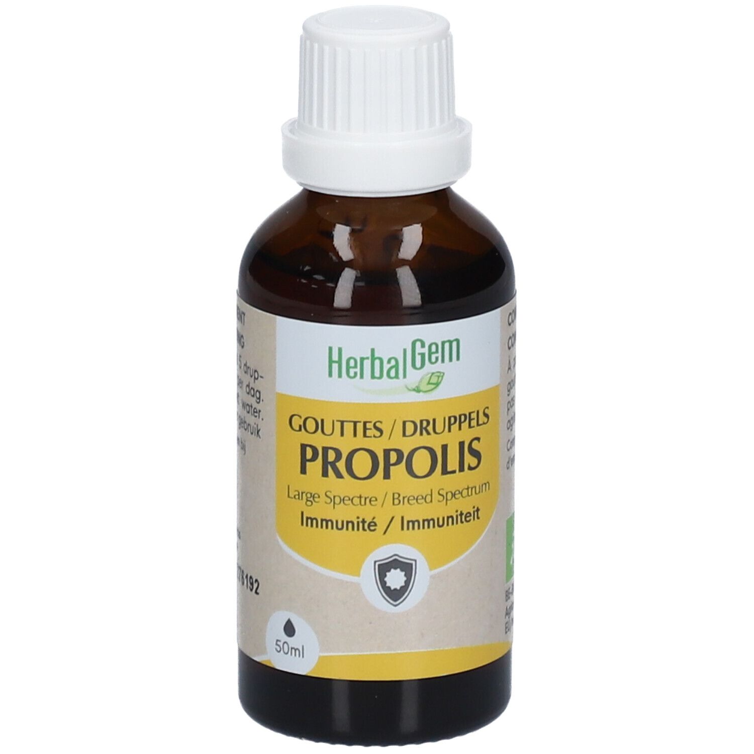 Flacon en verre brun avec bouchon blanc. Étiquette avec nom et logo. 50ml.