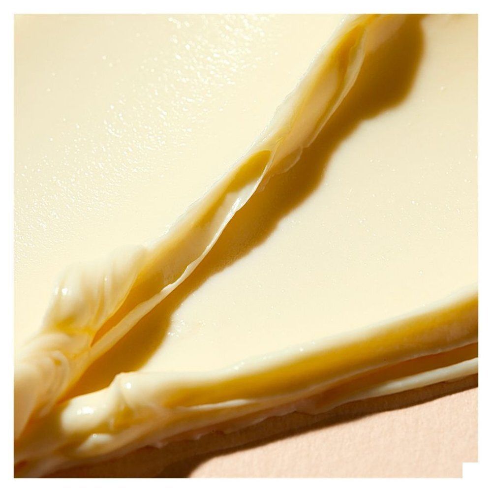 Arrière du pot NUXE Rêve de Miel® Baume Visage avec instructions d'application.