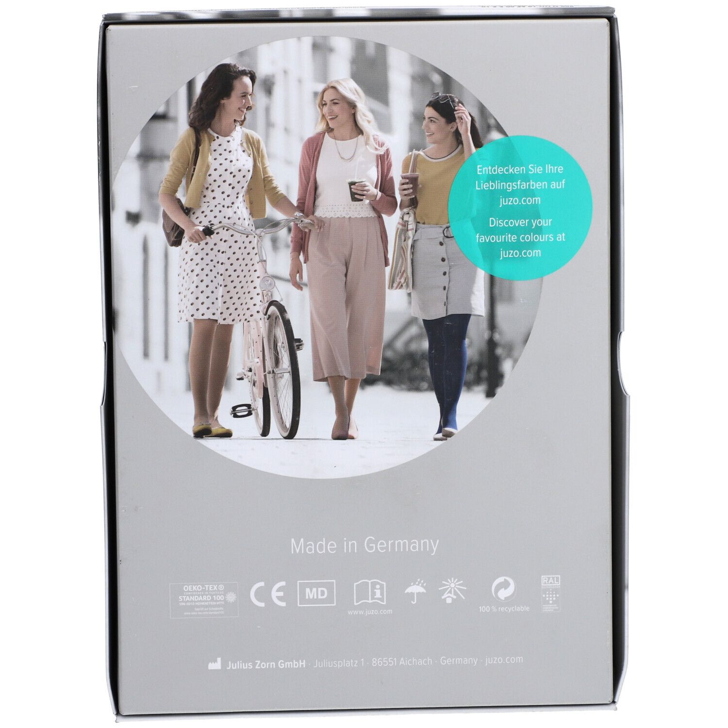 Dos de l'emballage. Trois femmes. Texte : Découvrez vos couleurs préférées sur juzo.com. Fabriqué en Allemagne. Logos et certifications.