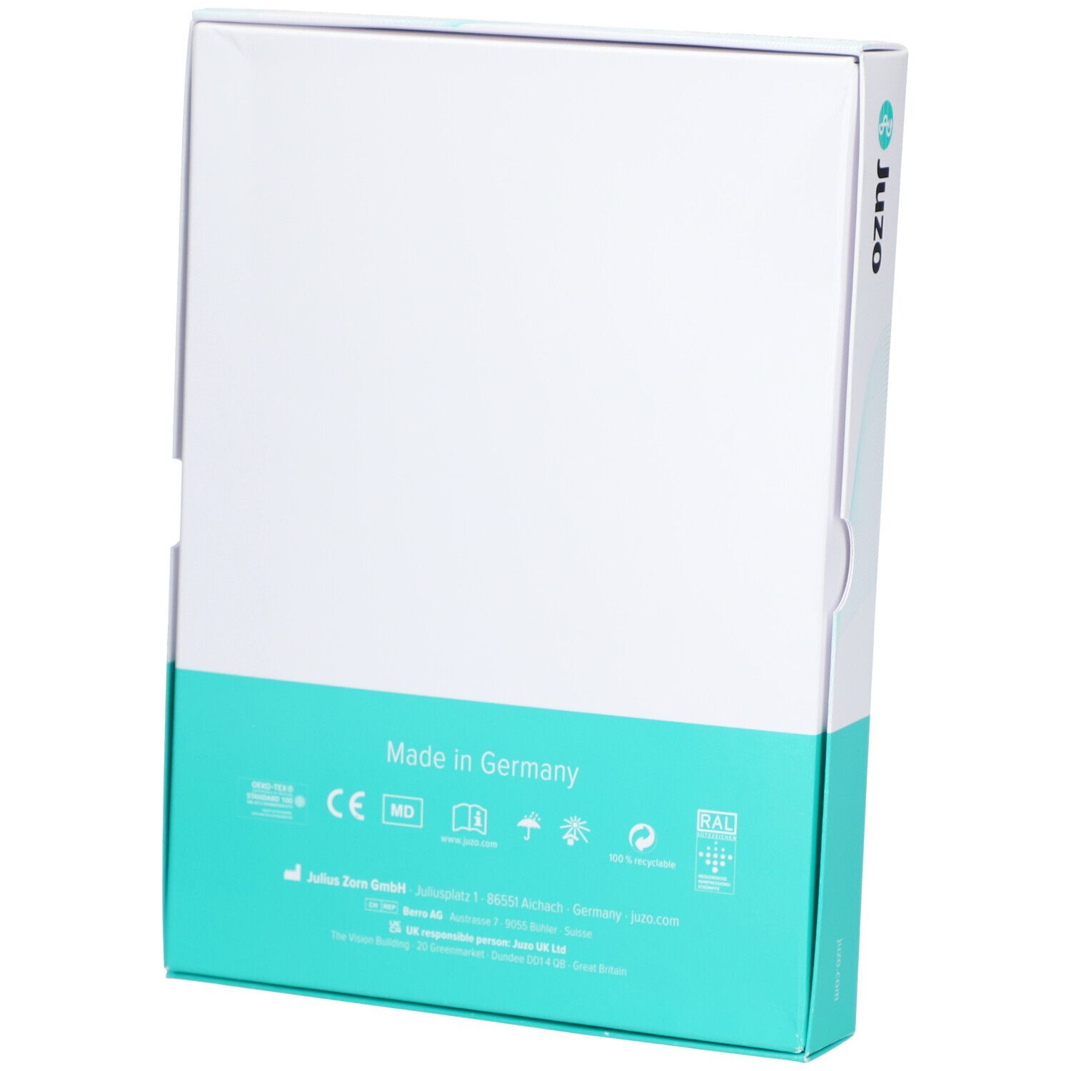 Dos de la boîte Juzo. Texte: Fabriqué en Allemagne. Couleurs: blanc et turquoise. Certifications.