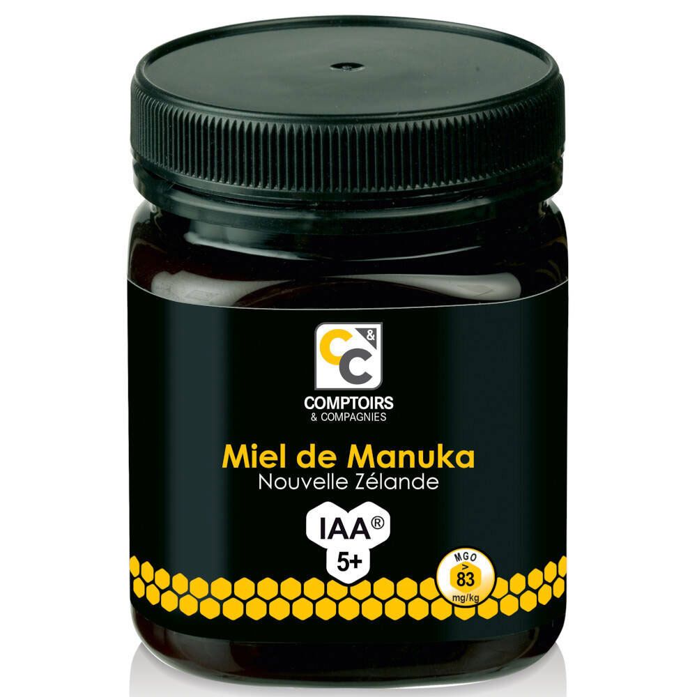 Pot de miel de Manuka Nouvelle Zélande IAA 5+. Pot en verre avec couvercle noir et étiquette noire.
