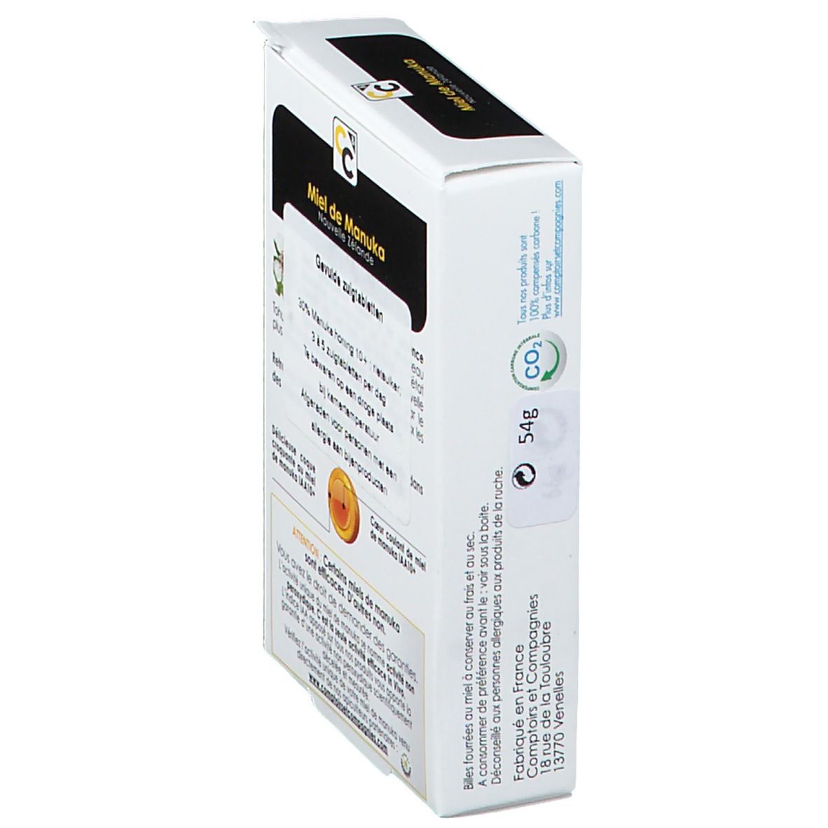 Vue latérale de la boîte Comptoirs & Compagnies Billes Fourrées Miel de Manuka IAA 10+. Texte et logo.