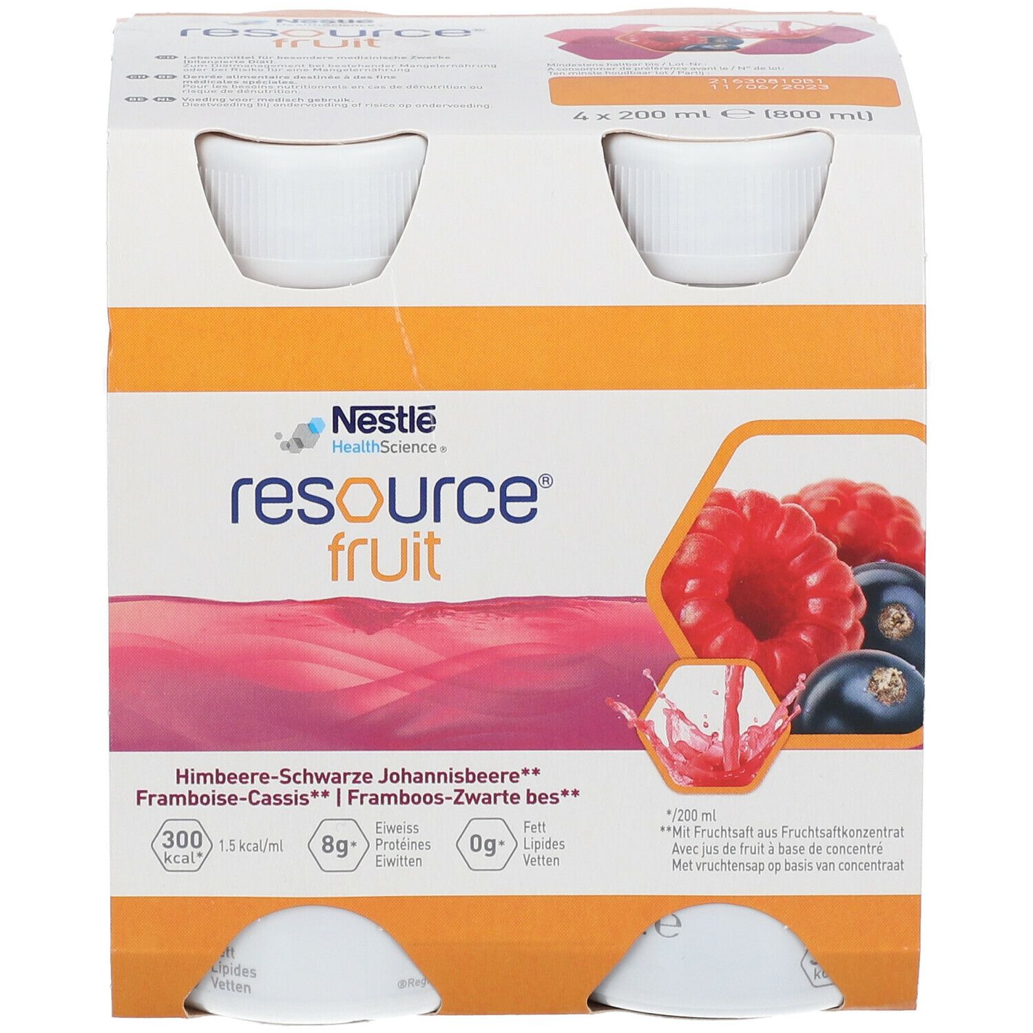 Emballage de quatre bouteilles. Inscription: Resource Fruit, Framboise-Cassis. Illustration de framboises et de cassis.