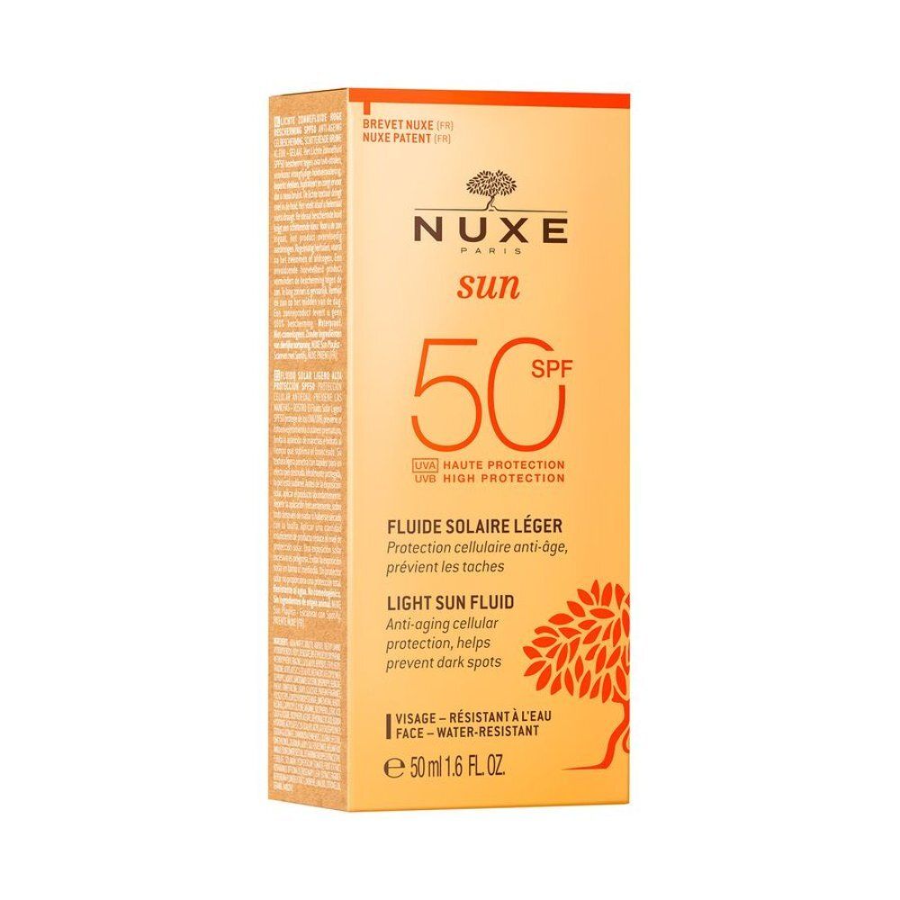 Nuxe Sun Fluide Solaire Léger SPF50 crème solaire dans un flacon orange.