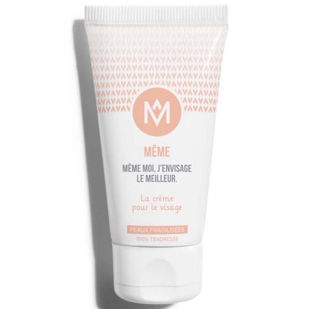 Tube de crème blanc avec logo MÊME et informations produit. Inscription : La crème pour le visage. Peaux fragilisées.