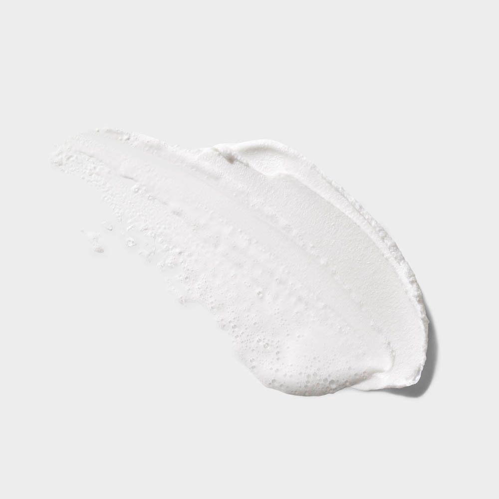 Arrière du flacon de 400ml CLINIQUE All About Clean Savon Visage Liquide Doux avec informations produit.
