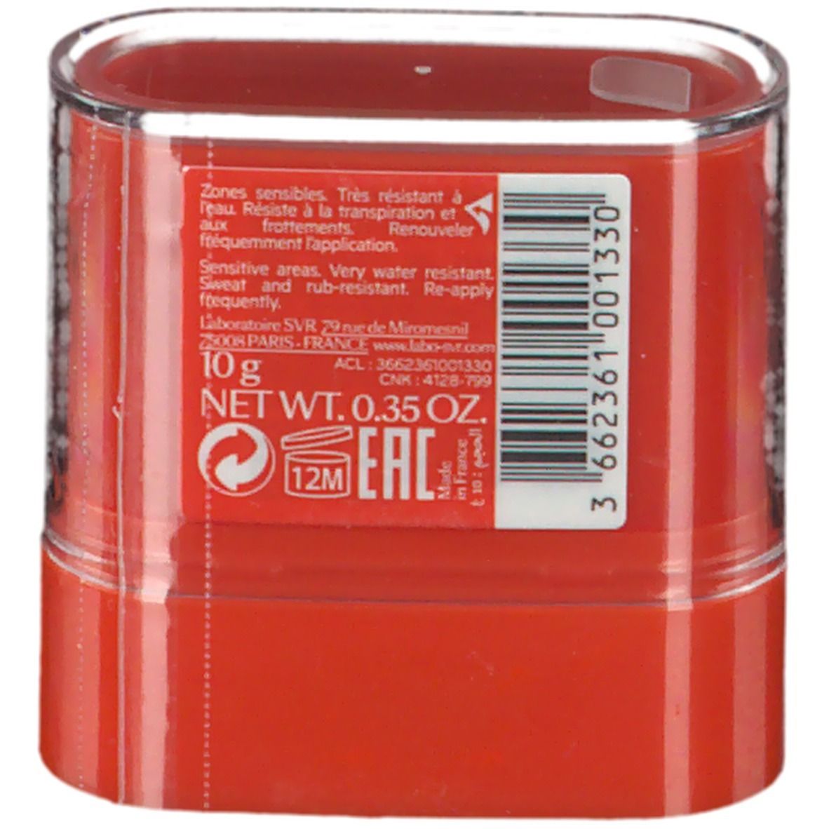 Contenant rouge cylindrique avec couvercle transparent. Informations produit et code-barres. Poids net 0,35 oz.