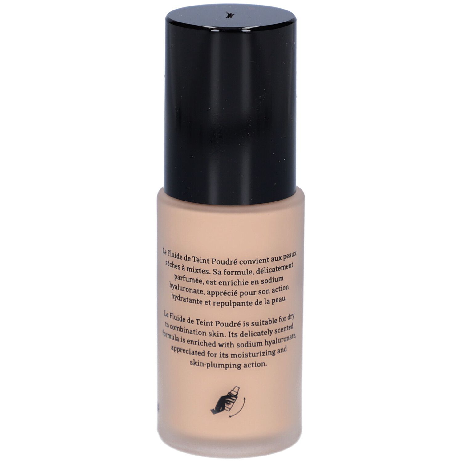 Fond de teint fluide beige dans un flacon cylindrique avec bouchon noir. Texte sur le flacon.