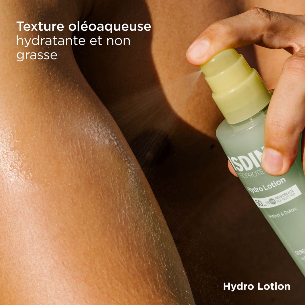 Flacon. Bouchon jaune, base bleue. Texte: ISDIN Fotoprotector Hydro Lotion 50. Inscription: Protect & Detox.