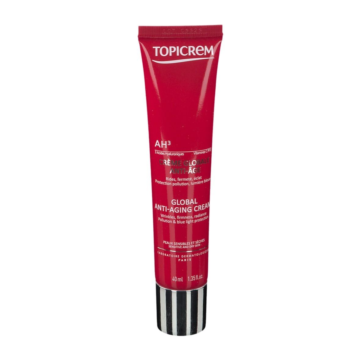 Tube rouge avec impression blanche. Contient AH3 Crème Anti-Âge Globale. Rayures noires et blanches en bas. Marque TOPICREM.