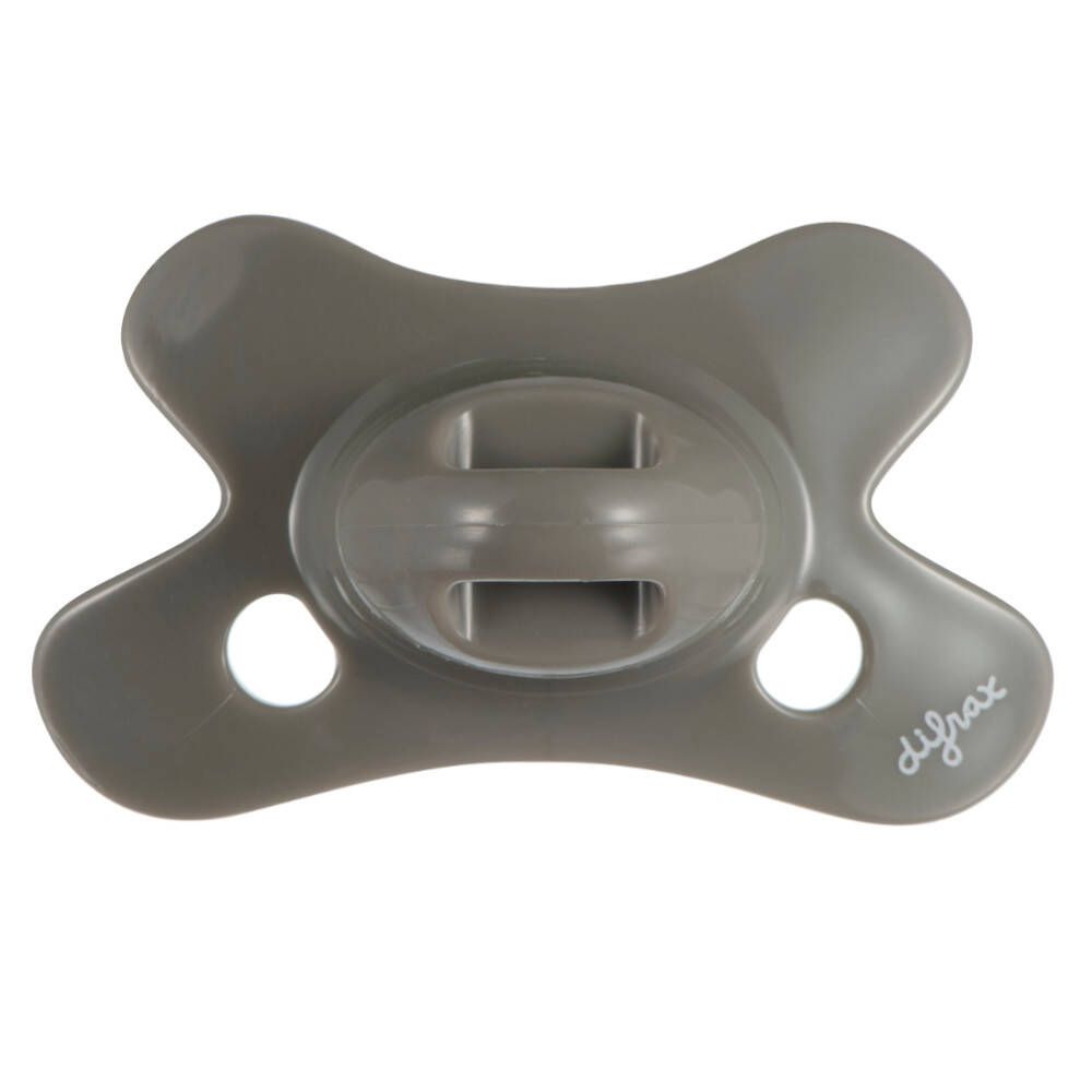 Sucette grise en forme de papillon avec deux trous. Marque difrax.