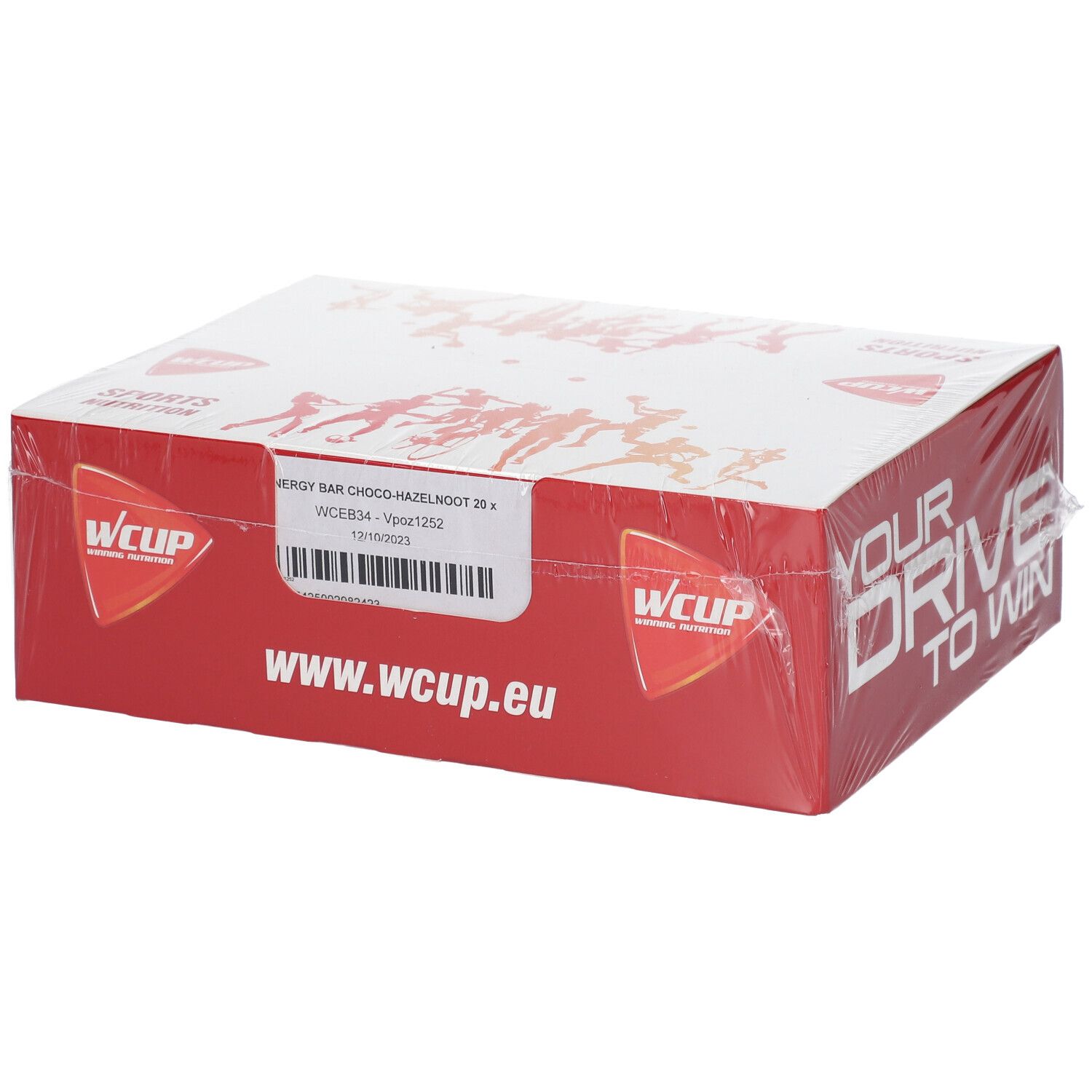 Emballage WCUP. Carton rouge, couvercle blanc. Inscription: ENERGY BAR CHOCO-HAZELNOOT 20 x. www.wcup.eu. Emballé dans du plastique transparent.