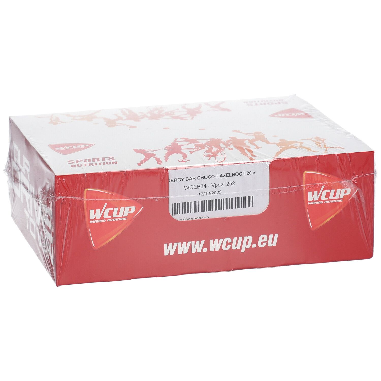 Emballage WCUP. Carton rouge, couvercle blanc. Inscription: ENERGY BAR CHOCO-HAZELNOOT 20 x. www.wcup.eu. Emballé dans du plastique transparent.