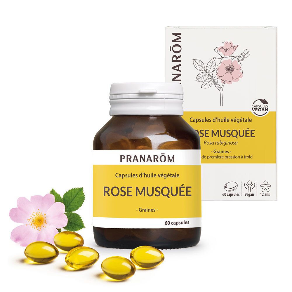 Flacon brun et boîte avec capsules. Inscription: Rose Musquée, 60 capsules, vegan. Fleur et capsules visibles.