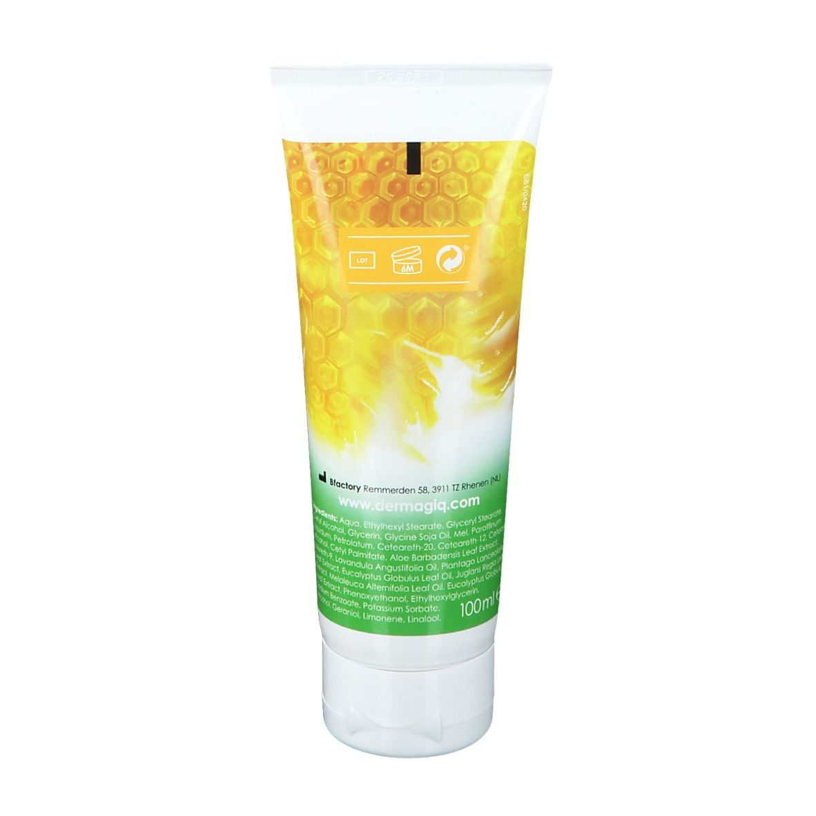 Dos du tube de crème. Design jaune et vert. Inscription: Dermagiq. Ingrédients et informations fabricant.