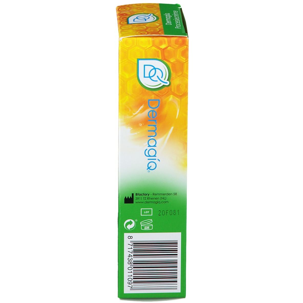 Boîte, design jaune et vert. Inscription: Dermagiq. Code-barres et numéro de lot. Texte vert.