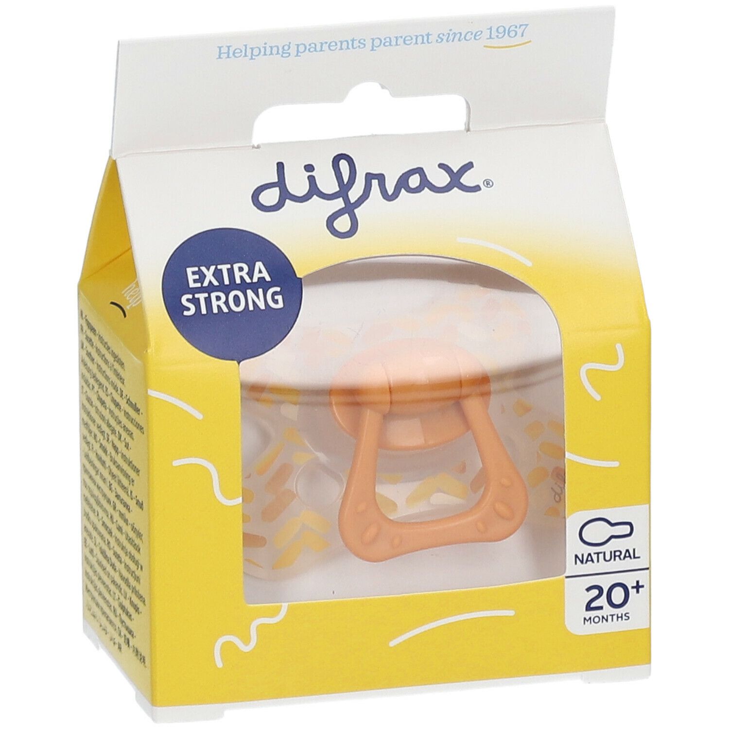 Sucette dans un emballage jaune. Visible : tétine orange, poignée. Inscriptions : difrax, EXTRA STRONG, NATURAL, 20+ MONTHS.