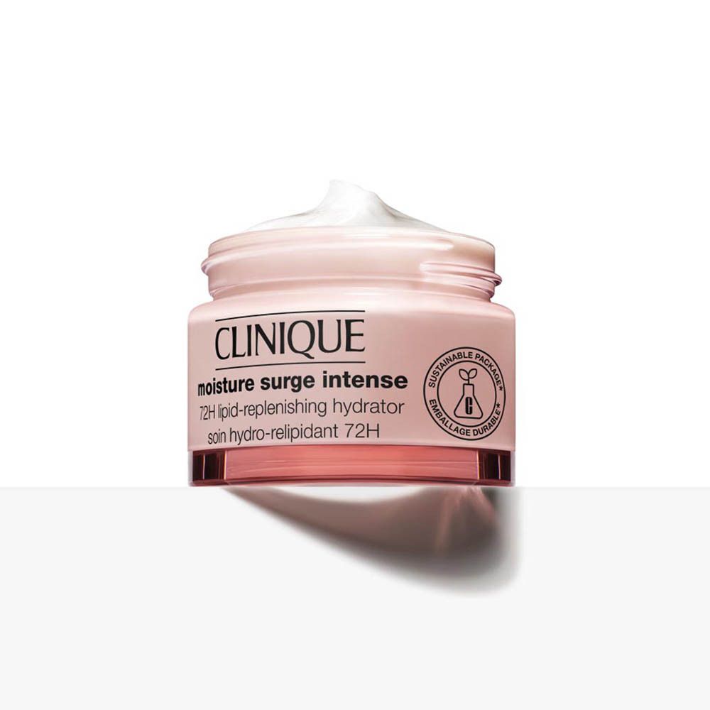 Crème hydratante Clinique Moisture Surge Intense dans un pot rose avec un couvercle argenté. Texture crémeuse visible.