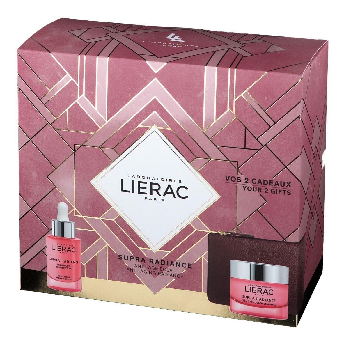 Coffret cadeau avec sérum, crème et trousse. Emballage rose avec logo et noms de produits. Textes visibles.