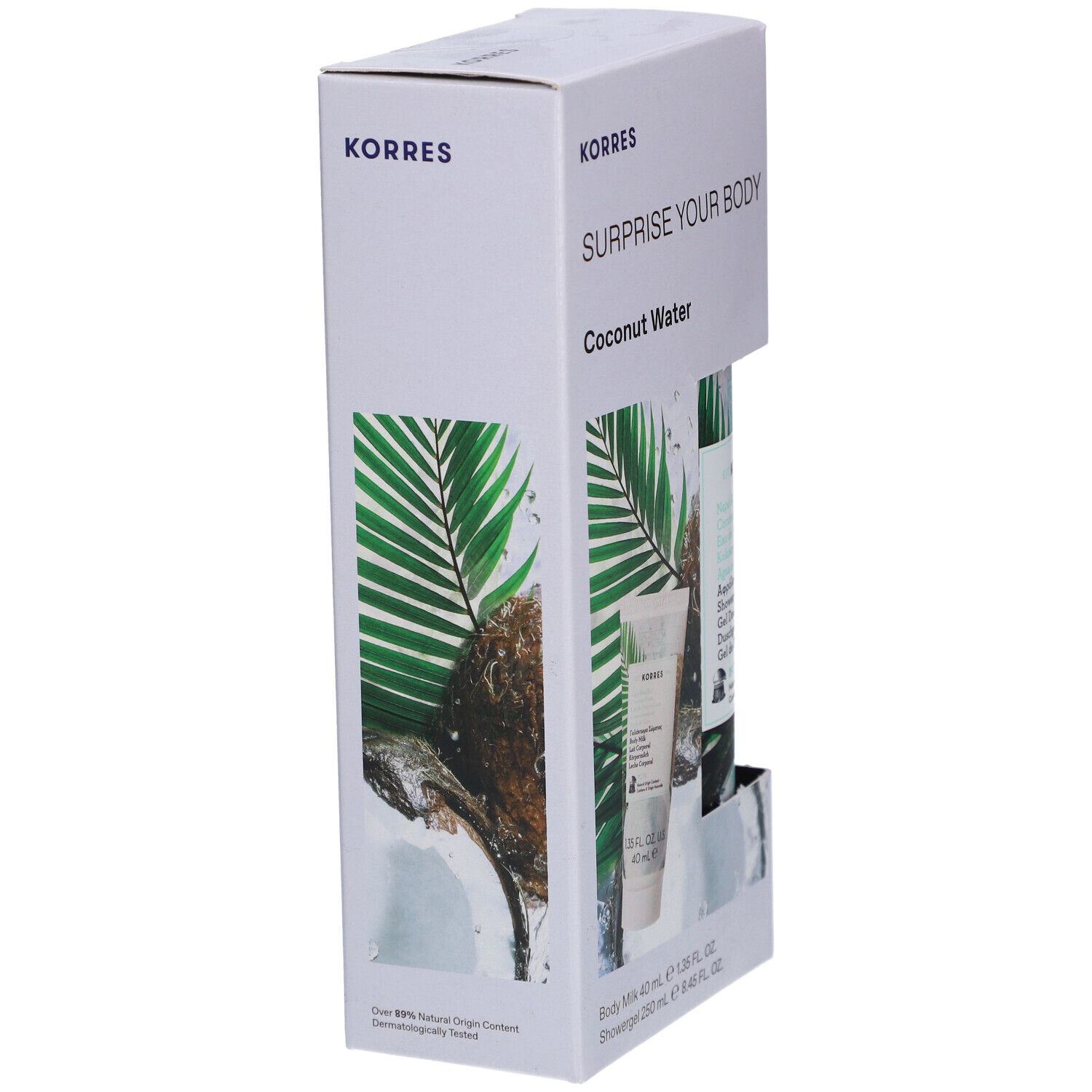 Coffret KORRES. Emballage blanc avec nom et logo du produit. Motif noix de coco. Contient lait corporel et gel douche.