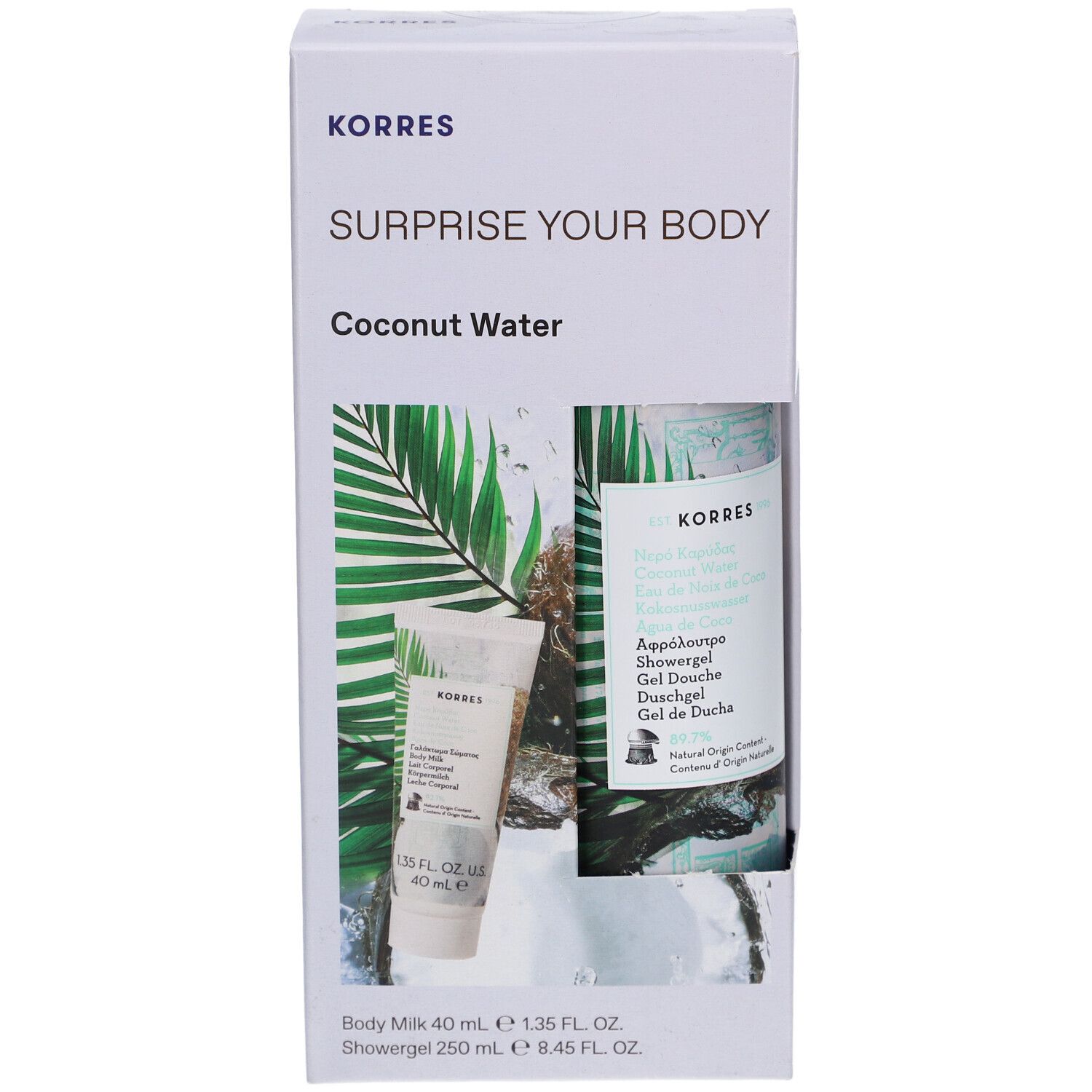 Coffret KORRES. Contient lait corporel et gel douche. Emballage blanc avec nom et logo du produit. Motif noix de coco.