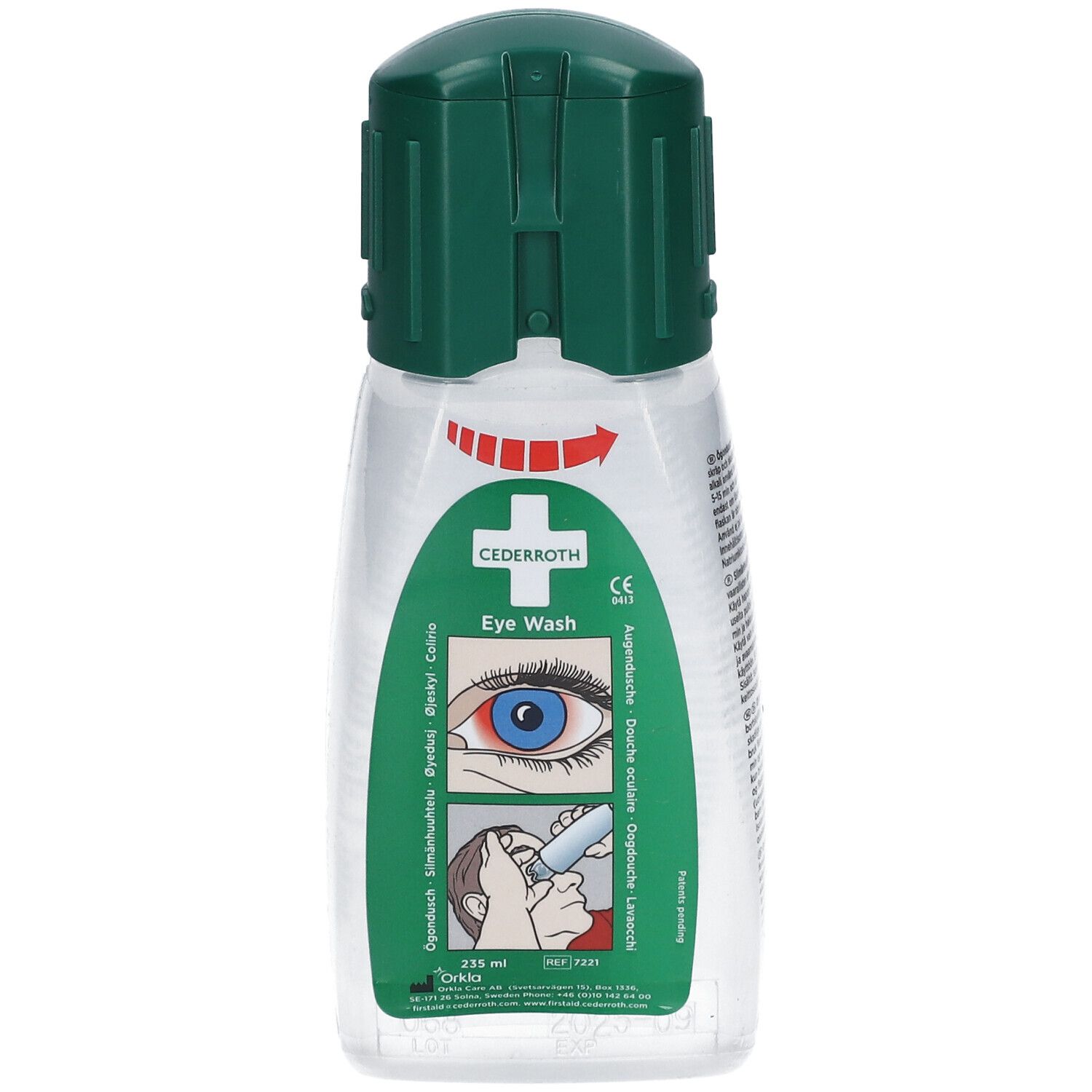 Flacon transparent avec bouchon vert. Inscription: Cederroth Eye Wash. Illustration d'un œil et de l'application.